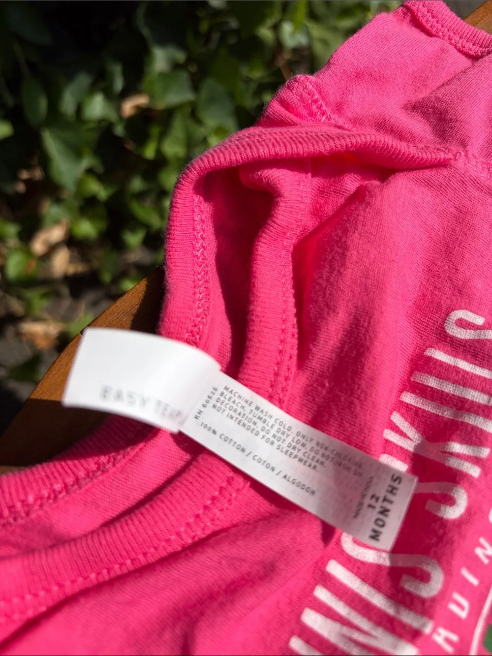 Pink Baby Onesie with 'Tennis Skills Loading' Graphic